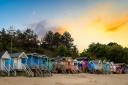 With its stripey beach huts, quaint harbour and golden sands edged by pine trees, Wells-next-the-Sea is a perfect seaside town