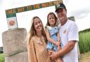 Victoria and Henry Cushing with daughter Matilda at the new maize maze at The Pumpkin House.