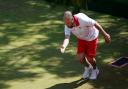 Jamie Chestney in action during the Men's Triples Gold medal match between Team England and Team Australia at Victoria Park