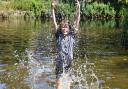 Piper Rhodes enjoying a swim in the river by Cow Tower on one of the hottest days of the year