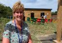 Jane Skeet, treasurer for The Friends of Burnham Market Primary School, with the new building she helped to fund