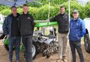 The Normac robotic farm machine demonstration at Hempton, near Fakenham. With the Farmdroid machine are Ernest Doi, Michael Massingham, Jim Pamment, and Richard Perry