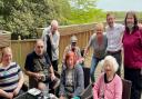 Duncan Baker MP (second from right) with staff and residents at Abbottswood Lodge care home in Swanton Abbott.