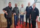 Brewers have made a beer named Tony's Tribute in memory of malting barley merchant Tony Banham. From left: David Holliday of Moon Gazer Ales, Rob Howlett of Barsham Brewery, Mark Banham of H Banham and brewers Andy Mitchell and Steve Chroscicki