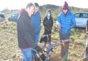 Robotics engineers from Antobot and Loughborough University trialling a new drone docking mechanism at Deepdale Farm in north Norfolk