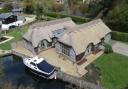 The Norfolk Broads property has a thatched roof.