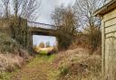 The road-bridge at Gateley carries a narrow country lane and runs over the former trackbed of the Wymondham-Wells railway line.