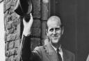 The Duke of Edinburgh greets the crowds on arrival at the Guildhall of St. George, King's Lynn. Dated 23 October 1959