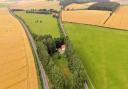 Fancy living in the middle of nowhere? This old bungalow is for sale in countryside close to one of Norfolk's most expensive locations.