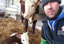 Norfolk cattle farmer Jeremy Buxton helped deliver a new calf before being called into action to pull stranded cars from snow drifts