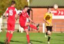 Despite all their problems Fakenham Town (amber) managed to field a side against Yelverton on Saturday. Picture: Nick Butcher