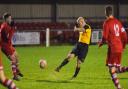 A Fakenham Town player shoots at goal during a match at Clipbush Park. Picture: IAN BURT