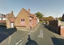 An arrest has been made after a man armed with a crowbar stole cash from a post office in Wells