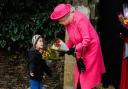 Ian's favourite image is of the Queen with his eldest son Freddie, at the age of 3. The Queen happily chatted to him at West Newton church.