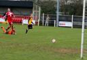 Ashley Jarvis puts Fakenham Town in front on Saturday. Picture: TONY MILES