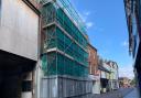 The building at 9 Norwich Street, Fakenham, surrounded by scaffolding