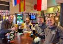 Punters at the Henry IV pub in Fakenham watching England's first game of the 2022 World Cup in Qatar