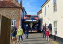 A 20ft yacht was seen wedged down a narrow street