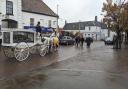 John ‘Jonathan’ Hollings's funeral procession through Fakenham was led by his husband Mark, and children Adam Hollings and Emma Marrison