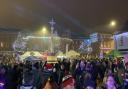 People gathered in Fakenham's Market Place to witness the Christmas light switch-on event take place