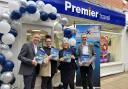 Paul Waters managing director at Premier Travel, two members of staff of Fakenham's Premier Travel and Peter Ryan from Celebrity Cruises at the shops opening