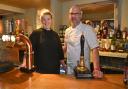 Emily Phipps and Richard Crouch behind the  bar at The Angel at Watlington Picture: Sonya Duncan