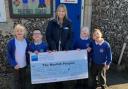 Pupils from the school even got to pose with a giant cheque following their fundraising success