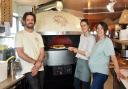 The owners of Flour Pizza, newly opened at Wells' Quay. From left, Matt Jarvis, Dulcie Browne, and Kiki Alvarez