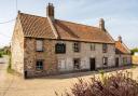 The White Horse pub in Holme, now owned by the Anglian Country Inns (ACI) group