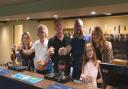 From L-R at The Pleasure Boat Inn in Hickling - Rachel Frain (NWT), John Blackburn (NWT), Andrew Pettitt (NWT), and new tenants Rick and Felicity Malt