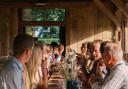 Diners enjoying a meal in The Copse at the Raynham Estate