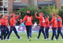 England players celebrate victory over Ireland in their T20 international in Dublin (Lorraine O’Sullivan/PA)