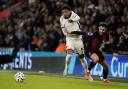 Chelsea attacker Jadon Sancho, left, battles with Bournemouth’s Adam Smith (Andrew Matthews/PA)