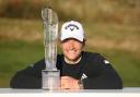 Denmark’s Rasmus Hojgaard poses with the Amgen Irish Open trophy following his win at Royal County Down (Peter Morrison/PA)