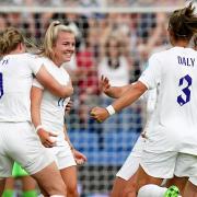 Lauren Hemp is congratulated by her England team-mates after scoring against Norway in the group stages of the Euros