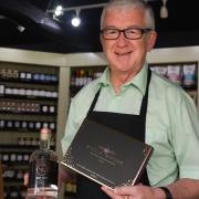 Owner Martin Dupee inside Willow Tree Delicatessen at Wroxham Barns