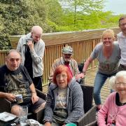 Duncan Baker MP (second from right) with staff and residents at Abbottswood Lodge care home in Swanton Abbott.