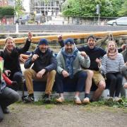 The Coastal Exploration Company team celebrate arriving at Pulls Ferry to deliver local produce from Wells to Jarrold. From left, Richard Jennings, Sarah Tribe, Henry Chamberlain, Charlie Hodson, Colin Howell, Safron Howell, Nick Stokes and Mark Watson