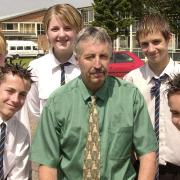 Deputy head Chris Allen when he retired from Attleborough High School after 37 years, pictured with pupils whose parents he also taught. From left, Shannon Fiveash (parents Elaine Eagling and Ian Fiveash); Philip Clarke (parents Julia Clarke and Andrew