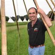 Norfolk farmer Algy Garrod with the teepees at his pop-up campsite at Themelthorpe, near Fakenham