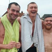 Archie, Murray and Henry (left to right) jumped off Wells quay into the water on Boxing Day.