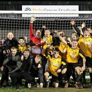 Fakenham FC celebrate at full time as they progress to the next round of the FA vase.