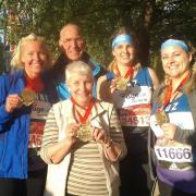 Colin Bunnett, daughter Caroline Armes, and grandaughters Carrie-Anne Armes and Laura-Mae Armes who ran the London Marathon with number one supporter Elaine Bunnett.  Picture: Bunnett family