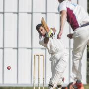 Cricket action from Fakenham v Godmanchester - Tariq Aziz for Godmanchester hits Lloyd Marshall away for runs. Picture: Matthew Usher.