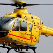 The air ambulance has been called after a three-vehicle crash