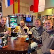 Punters at the Henry IV pub in Fakenham watching England's first game of the 2022 World Cup in Qatar