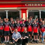 The coach of Swanton Morley Blacks Under-16 mixed football team, Matt Jarman (far left) with his players, assistant Craig Barnett (right) and Cherry Tree owners Morgana Hale and Sarah Godsoe