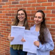 Amelia Zahid (right) and Maisie Tye at Dereham Sixth Form College on August 17 to get their A-level results