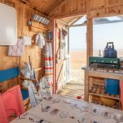 Inside beach hut Flounder looking out to the beach