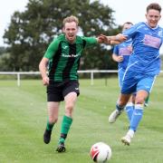 Wells Town Res in action against Feltwell United